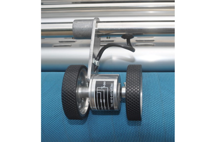 富怡吹風(fēng)式自動對邊松布機